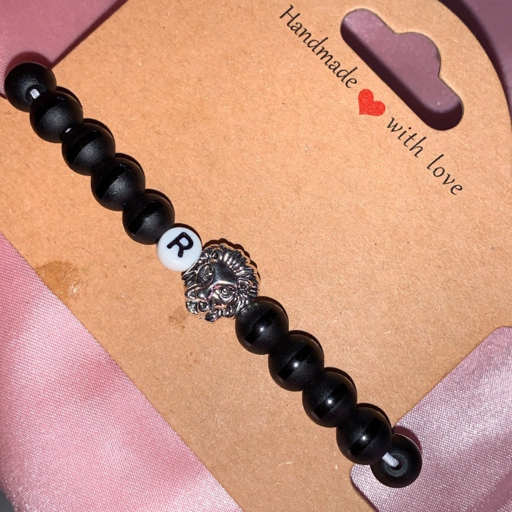Black Beaded Bracelet with Silver Lion Charm